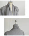A knit cardigan with a casual yet elegant look, studded with jewels