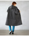 A knit coat with a mixed knit that doesn't look flat and can be worn like a cardigan