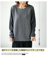 A top made of different materials with an embossed, pockmarked knit pattern