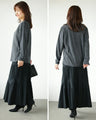 A top made of different materials with an embossed, pockmarked knit pattern