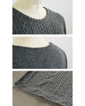 A top made of different materials with an embossed, pockmarked knit pattern