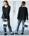 A top made of different materials with a embossed pattern
