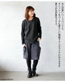 A top made of different materials with a embossed pattern