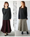 A top made of different materials with a embossed pattern