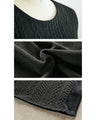 A top made of different materials with a embossed pattern