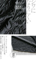 A unique black top with ruffled shirring and irregular hem