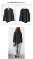 A unique black top with ruffled shirring and irregular hem