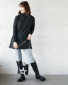 Off-neck A-line knit top with square cut for a slimmer look