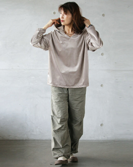 A glossy velour that is more than just casual. An original and elegant hoodie for adults.