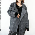 A monotone tweed coat that goes well with any style