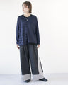 Stylish logo for adults. Asymmetrical knitwear
