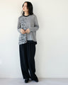 Stylish logo for adults. Asymmetrical knitwear