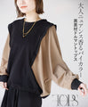 A bicolor dolman top made from different materials for a sophisticated look