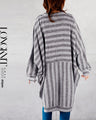 A loose, comfortable, and loose long knit cardigan
