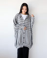 A loose, comfortable, and loose long knit cardigan