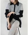A one-piece look. A shirt with a combination of different materials