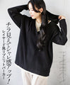 A layered ribbed knit hoodie that peeks out for a stylish look