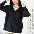 A layered ribbed knit hoodie that peeks out for a stylish look