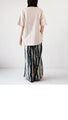 A crinkled shirred T-shirt that perfectly matches your personality