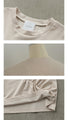 A crinkled shirred T-shirt that perfectly matches your personality