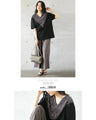 A chic adult zebra print top with a big V-neck that makes your face look smaller