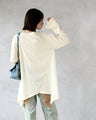 A long top that can be worn in many different ways to hide and show off