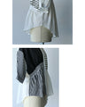 A mixed shirt top with a striking pattern