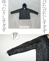 A light and fashionable wavy sheer cut and sewn top