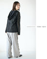 A light and fashionable wavy sheer cut and sewn top