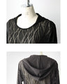 A light and fashionable wavy sheer cut and sewn top