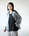 A light and fashionable wavy sheer cut and sewn top