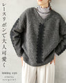 A textured knit top with lace ribbon for a mature and cute look