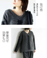 A textured knit top with lace ribbon for a mature and cute look