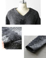 A textured knit top with lace ribbon for a mature and cute look