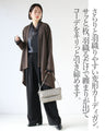 A deformed topper cardigan with a rich drape for a mature look