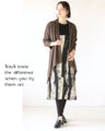 A deformed topper cardigan with a rich drape for a mature look