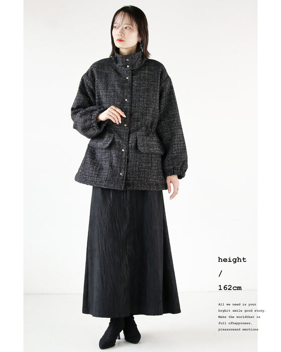 A classy coat made of sparkling tweed
