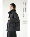 A classy coat made of sparkling tweed