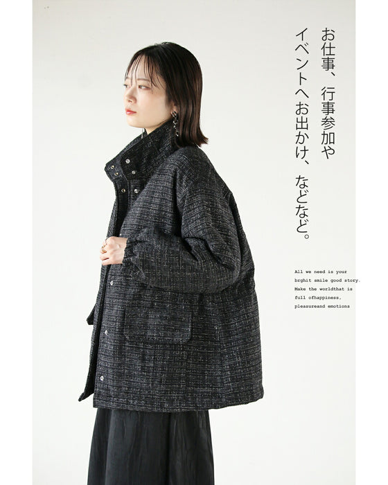 A classy coat made of sparkling tweed