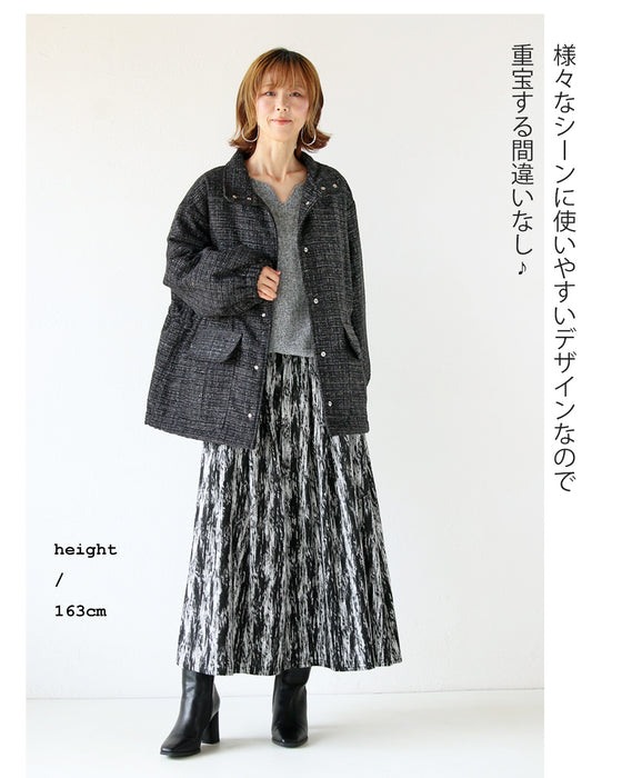 A classy coat made of sparkling tweed