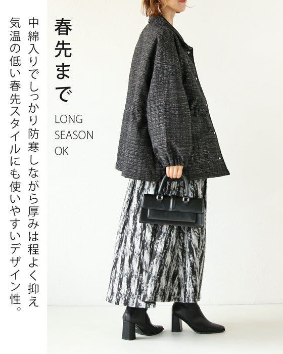 A classy coat made of sparkling tweed
