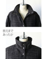 A classy coat made of sparkling tweed