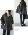 A classy coat made of sparkling tweed