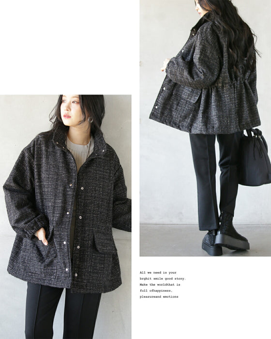 A classy coat made of sparkling tweed