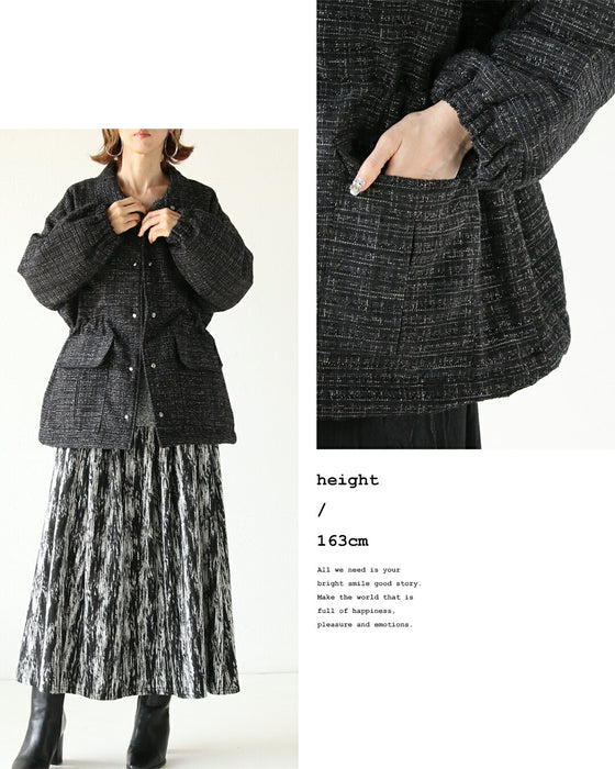 A classy coat made of sparkling tweed