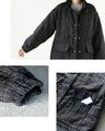 A classy coat made of sparkling tweed