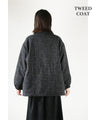 A classy coat made of sparkling tweed