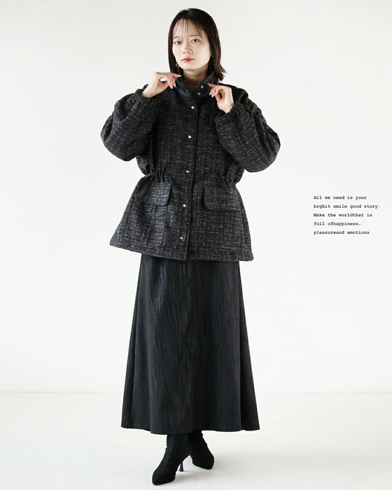 A classy coat made of sparkling tweed