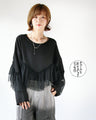 A tulle top that's not too voluminous and will make your heart flutter with adults.