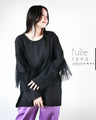 A tulle top that's not too voluminous and will make your heart flutter with adults.